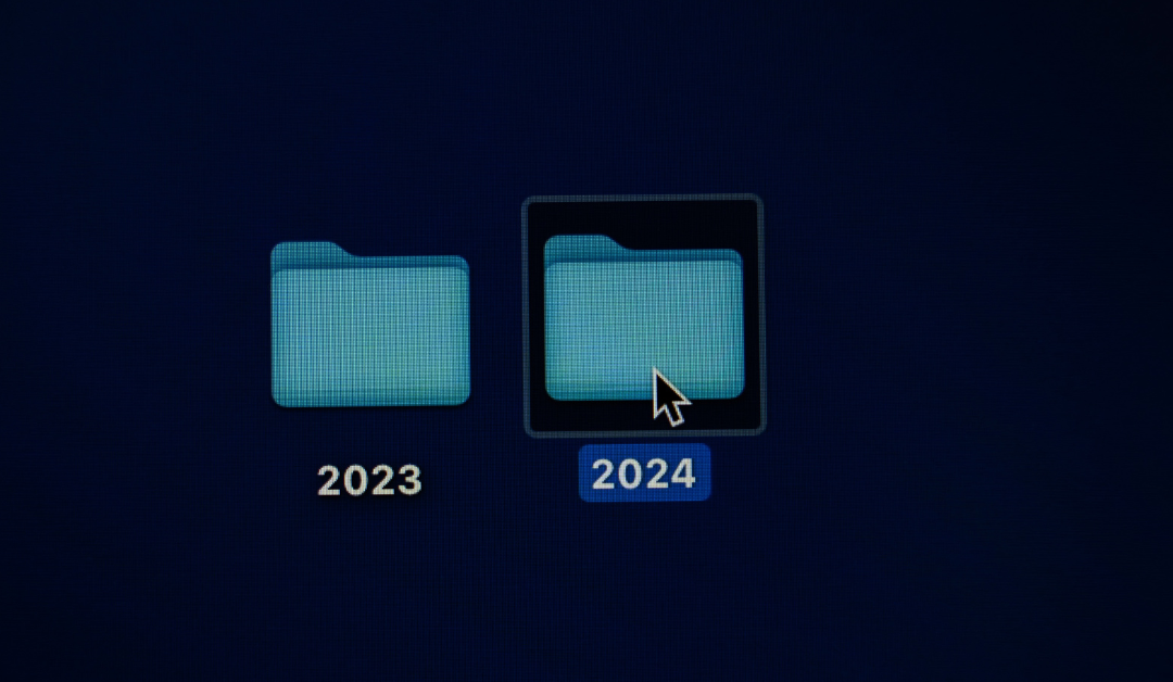 computer screen with dark blue background showing files labeled 2023 and 2024 with curser over 2024 to represent checklist for startups in 2024