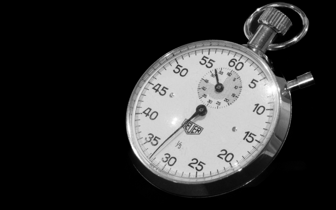 a stop watch on a black background to represent timing as a reason why startups fail.