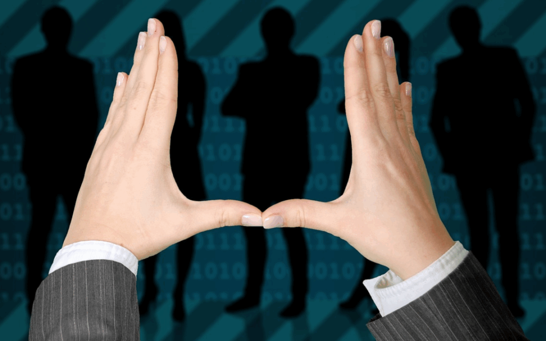 Hands coming out of suit and framing a silhouette to represent choosing between angel vs. VC investors.